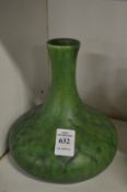 A Royal Lancastrian green mottle glazed squat shaped vase.