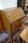 A walnut bureau.