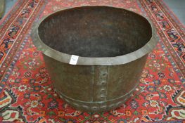 A large copper log box.