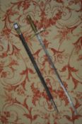 An early 19th century sword and scabbard, possibly made for theatrical use.