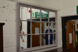 An Oka sash window style mirror in distressed grey finish.