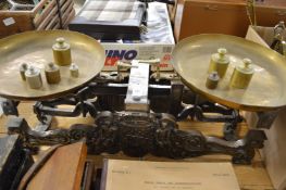 A good large set of cast iron and brass weighing scales.
