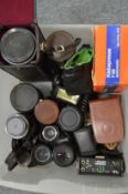 A collection of Carl Zeiss and other lenses to include a Sigma telephoto lens etc.