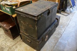 Two tin trunks, one containing trolley jack and accessories.