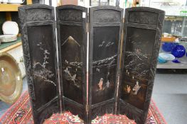 A small Japanese lacquer four panel folding screen.