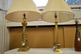 Two brass column style lamps.