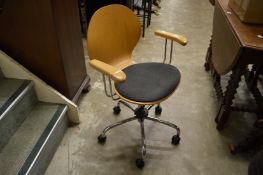 A stylish typists chair.