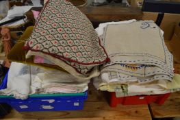 Two boxes of textiles.