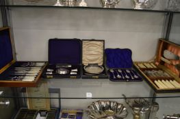 A cased set of six silver coffee spoons and various other plated items to include a travelling