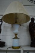 An ormolu and opalescent glass urn shaped lamp.