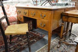 An Edwardian inlaid mahogany writing desk.