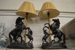 A pair of Spelter Marley Horse table lamps.
