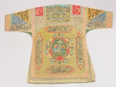 A 20TH CENTURY ISLAMIC OTTOMAN TALISMANIC HAND-PAINTED SHIRT / JAMA, the reverse painted with a