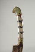 A FINE 19TH CENTURY INDIAN JADE AND MOTHER OF PEARL HILTED PESH KABZ DAGGER, with leather overlaid