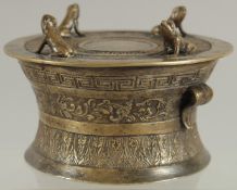 AN ANNAMESE BRONZE RAIN DRUM WITH RELIEF CAST FROGS, 16cm diameter.
