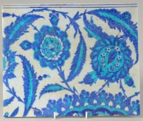 A LARGE OTTOMAN TURKISH GLAZED POTTERY TILE, with floral motifs, 33cm x 27.5cm.