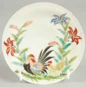 A SMALL PORCELAIN CHICKEN DISH, the reverse with character mark, 12.5cm diameter.