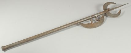 AN UNUSUAL 19TH CENTURY NORTH INDIAN SILVER INLAID STEEL COMBINATION AXE, 85cm long.