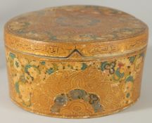 AN INSCRIBED PAPIER MACHE CIRCULAR LIDDED BOX, (af), 20.5cm diameter.
