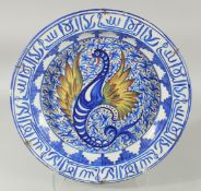 A SPANISH ISLAMIC MARKET BLUE AND WHITE CHARGER, painted with central decorative motif and