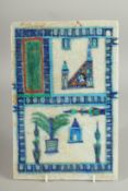 A RARE ISLAMIC GLAZED POTTERY TILE, 29cm x 19cm.