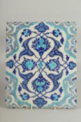 A RARE LARGE OTTOMAN IZNIK TILE, 32.5cm x 27cm.
