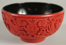 A CHINESE CINNABAR LACQUER BOWL, 12.5cm diameter.