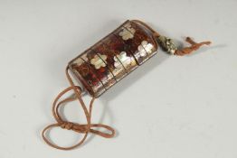 A FINE JAPANESE MOTHER OF PEARL INLAID LACQUER INRO, with speckled gilt and flower head