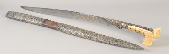 A FINE OTTOMAN TURKISH SILVER MOUNTED YATAGHAN, with gold inlaid inscription to the blade, bone hilt