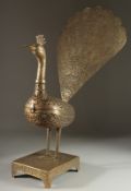 A FINE LARGE INDO PERSIAN QAJAR OPENWORKED BRASS PEACOCK INCENSE BURNER, decorated with pierced