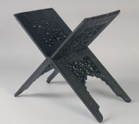 A FINELY ENGRAVED MID-19TH CENTURY INDIAN EBONY QURAN STAND, 36.5cm wide at base (opened).