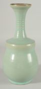 A CHINESE CELADON GLAZE VASE, with ribbed neck, 29cm high.