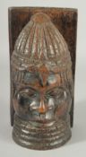 A BENIN CARVED WOOD HEAD, 25.5cm high.