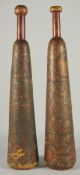 A RARE PAIR OF 19TH CENTURY PERSIAN QAJAR LACQUERED WOODEN EXERCISE CLUBS, 62cm long.