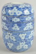 A CHINESE BLUE AND WHITE PORCELAIN STACKING FOOD CONTAINER, comprising four sections, painted with