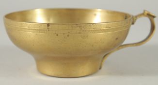 AN ISLAMIC OTTOMAN BRASS CUP.