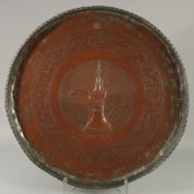 A LARGE AND UNUSUAL 19TH CENTURY OMANI TINNED COPPER TRAY, with a jambiya coffee pot Dallah