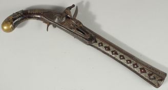 AN OTTOMAN SILVER INLAID FLINTLOCK PISTOL, 43cm.