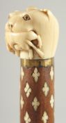 A FINE EARLY 19TH CENTURY MUGHAL INDIAN BONE INLAID WOODEN CANE, 92.5cm high.