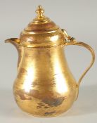 AN OTTOMAN TURKISH TOMBAK COFFEE POT, 18cm high.