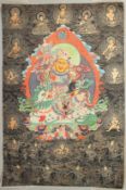 A TIBETAN THANGKA, mounted on paper.