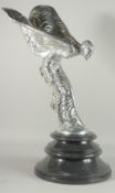 A LARGE SILVERED ROLLS ROYCE FIGURE, spirit of ecstasy, on a circular base.