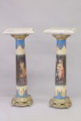 A VERY GOOD NEAR PAIR OF SEVRES DESIGN PORCELAIN, COLOURED COLUMNS with metal tops