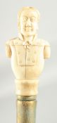 A WALKING STICK WITH CARVED BONE HANDLE 'NAVAL MAN'