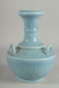 AN UNSUAL CHINESE LIGHT BLUE THREE HANDLED VASE. Square blue mark.