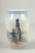 A COPENHAGEN PORCELAIN VASE, mother and daughter. Pattern, 4547. 7ins high.