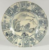 A CHINESE BLUE AND WHITE PORCELAIN PLATE with figures. 10.75ins diameter.