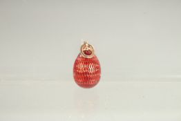 A 14CT GOLD RUSSIAN RED ENAMEL EGG PENDANT.