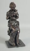 A 19TH CENTURY BRONZE OF A YOUNG GIRL holding a nest of birds. 12ins high.
