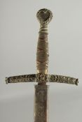 A GERMAN SWORD in a leather scabbard with brass and wire handle. 39ns long.